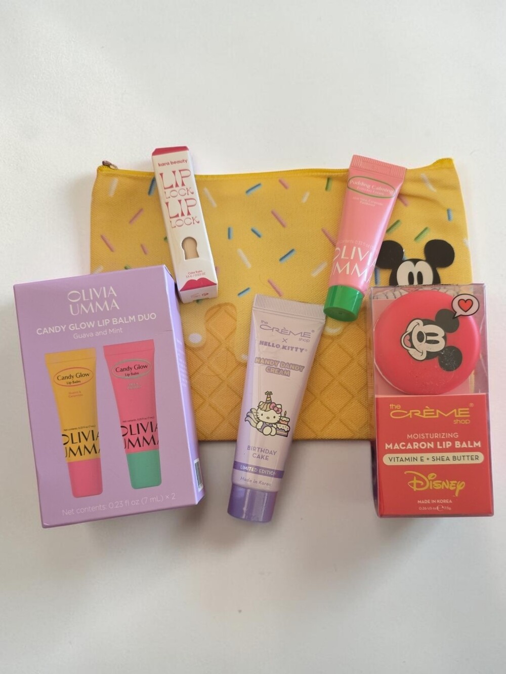 Disney x The Creme Shop Macaron Lip Balm/ Yellow Sprinkles Pouch Beauty Bundle